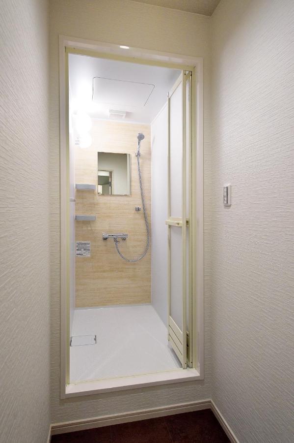 Hotel The Rock Osaka Bagian luar foto