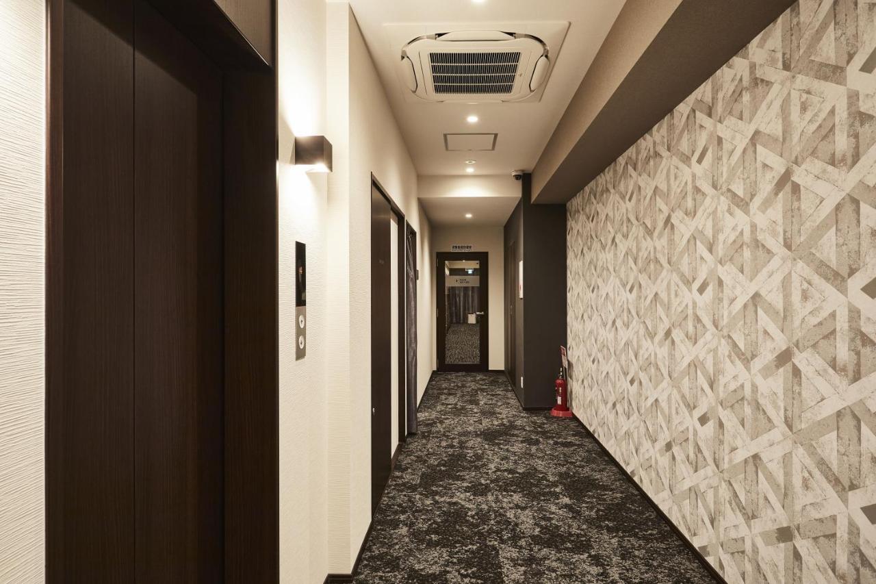 Hotel The Rock Osaka Bagian luar foto